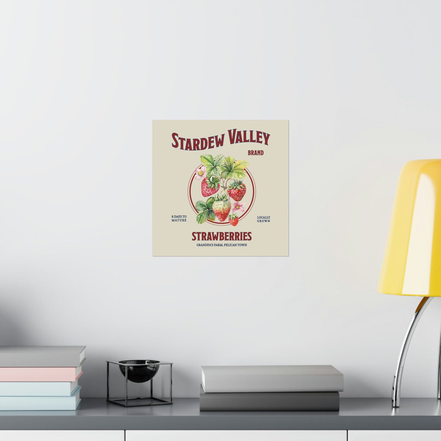 A small Stardew Valley Strawberries Print by New Save hanging on a wall.