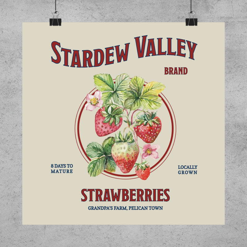 A Stardew Valley Strawberries Print by New Save hanging from paperclips against a concrete wall.